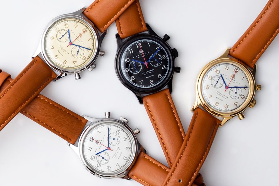 A stylish flat lay of vintage wristwatches with leather straps on a white background. A stylish flat lay of vintage wristwatches with leather straps on a white background.