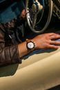 Person Wearing Silver Round Analog Watch