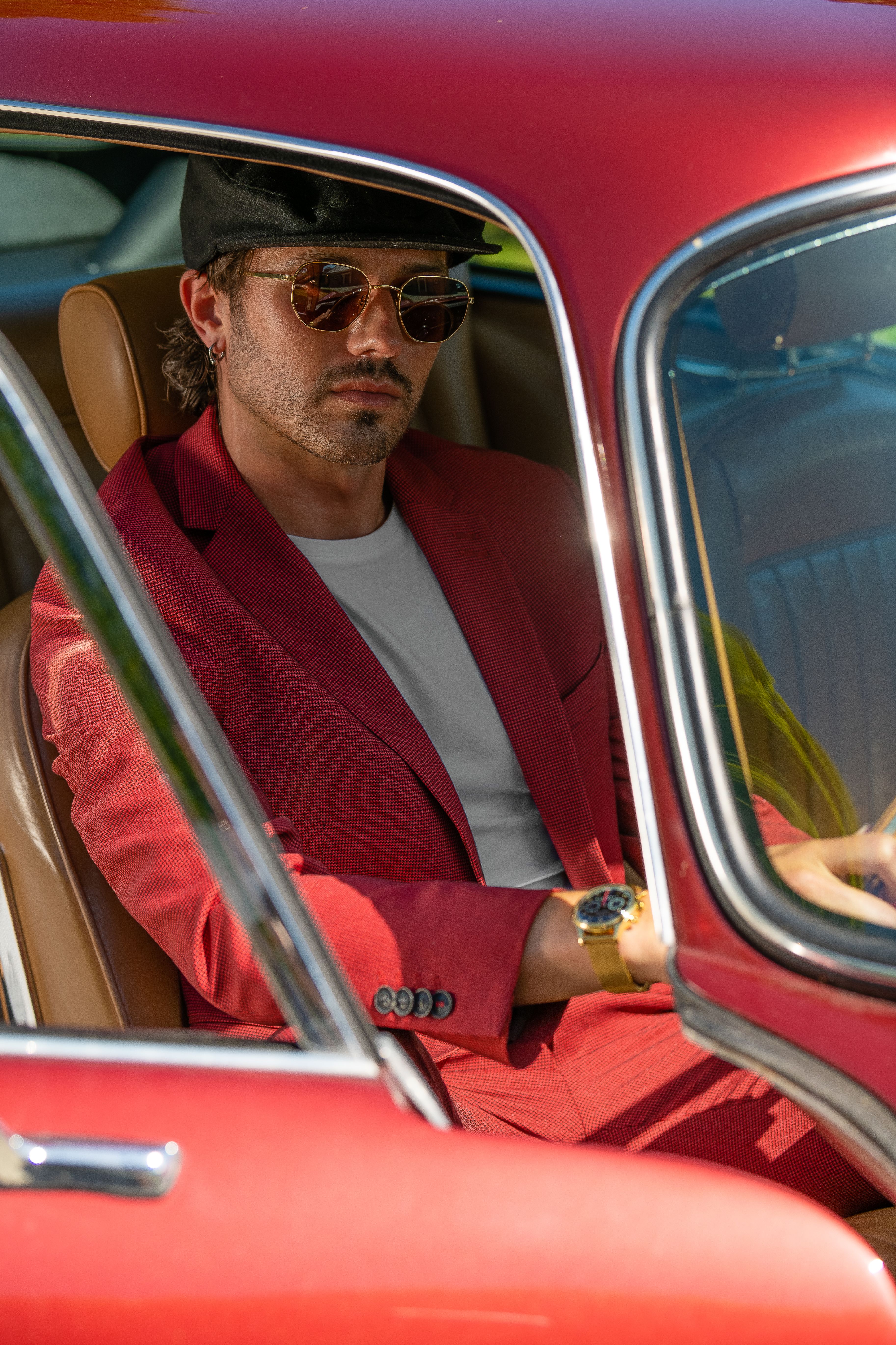 Man in Red Suit Jacket Sitting in the Car · Free Stock Photo