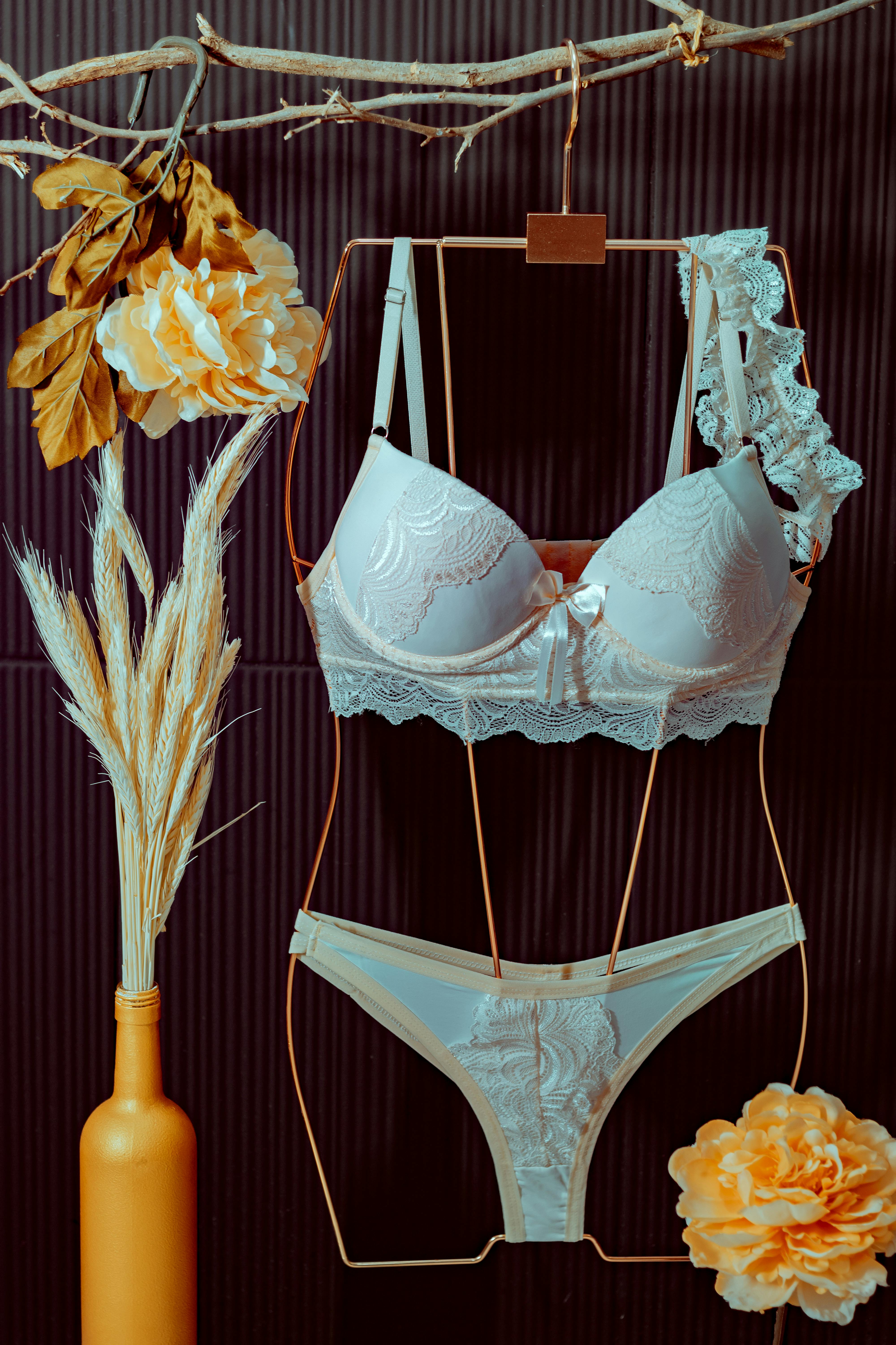 White Lingerie on a Clothes Hanger · Free Stock Photo