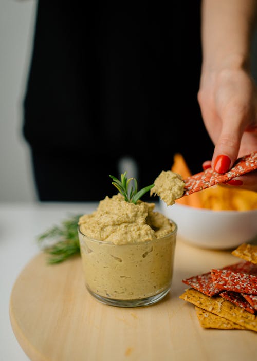 Free Close-up Photo of Humus on a Glass Stock Photo
