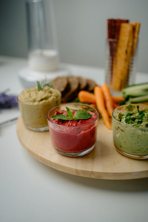 Clear Glass Cups on the Wooden Tray