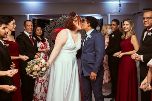 Free Newlyweds Sharing A Kiss Stock Photo