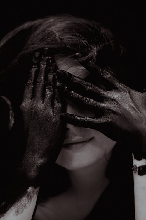 Close Up Photo of Hands on Woman's Face