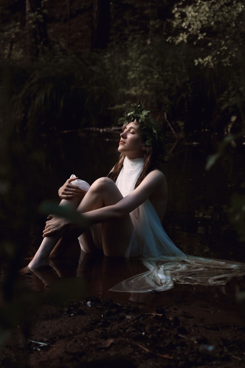 A Woman in White Dress Sitting on Water · Free Stock Photo