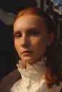 Girl in White Collared Shirt