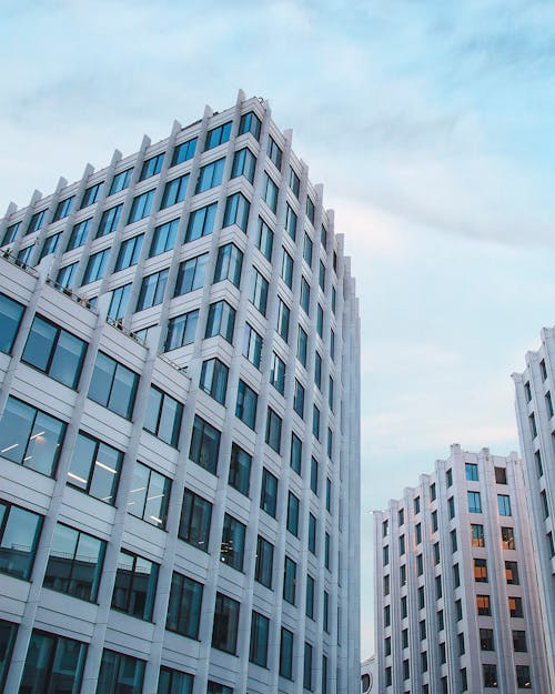 White Concrete Building Under White Sky