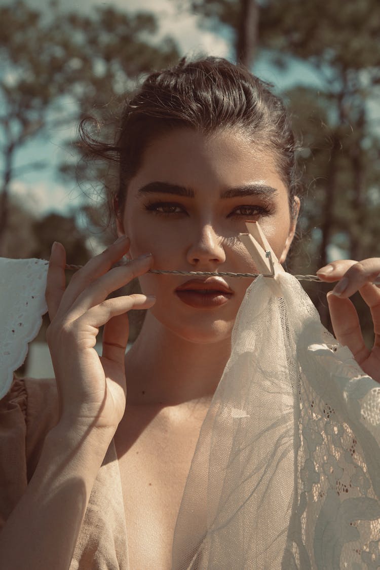 Woman Holding A Clothes Line