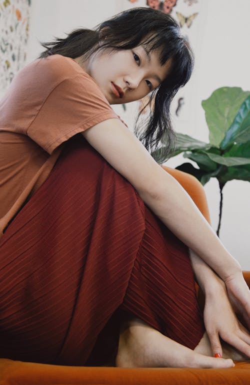 A Woman Sitting on the Couch