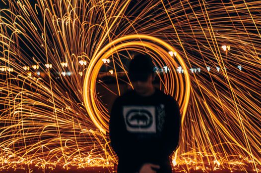 A vibrant long exposure shot of light painting with a man in Casablanca, Morocco.