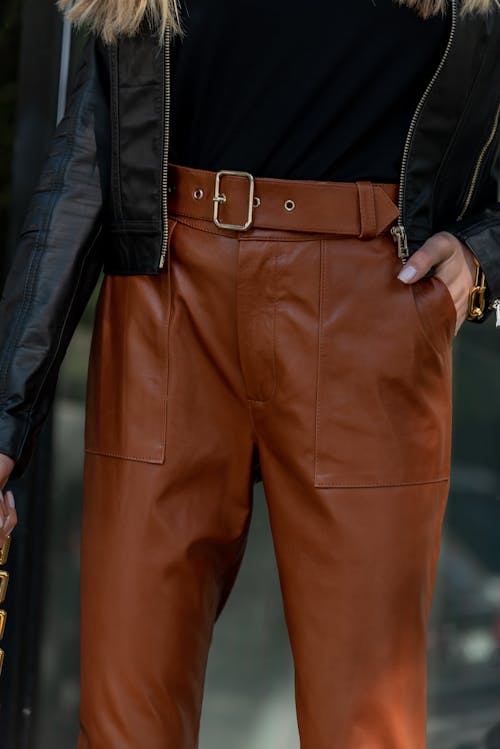 A Person in Brown Leather Pants