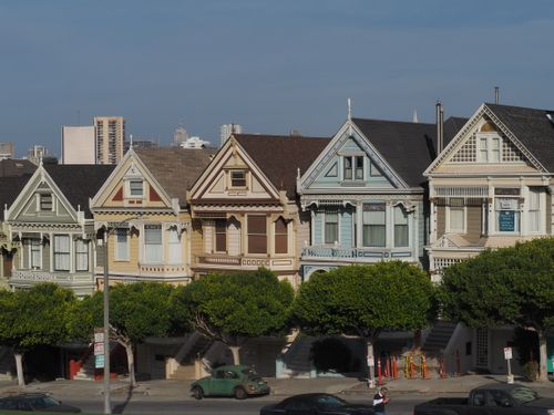 Free Iconic Victorian houses, the Painted Ladies, against a clear blue sky in San Francisco. Stock Photo