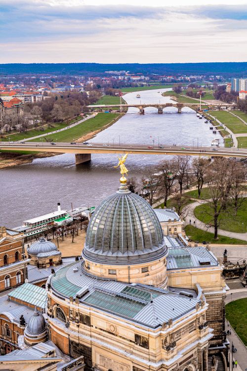 Free Stunning aerial view showcasing Dresden's architecture with the River Elbe flowing beneath iconic bridges. Stock Photo