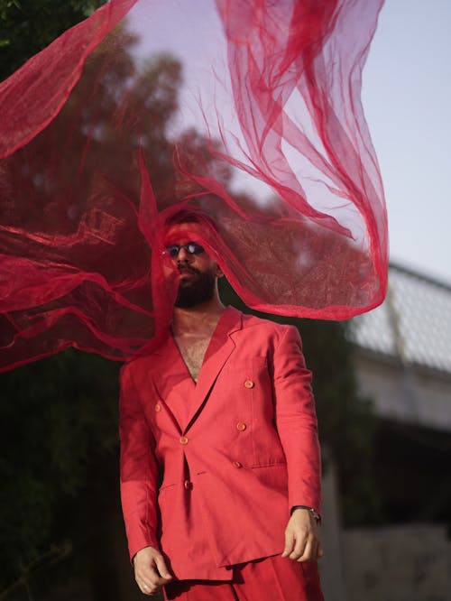 Bearded Man Wearing Red Suit