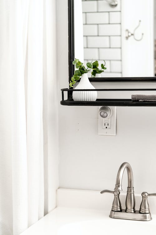 White Ceramic Sink with Chrome Faucet 