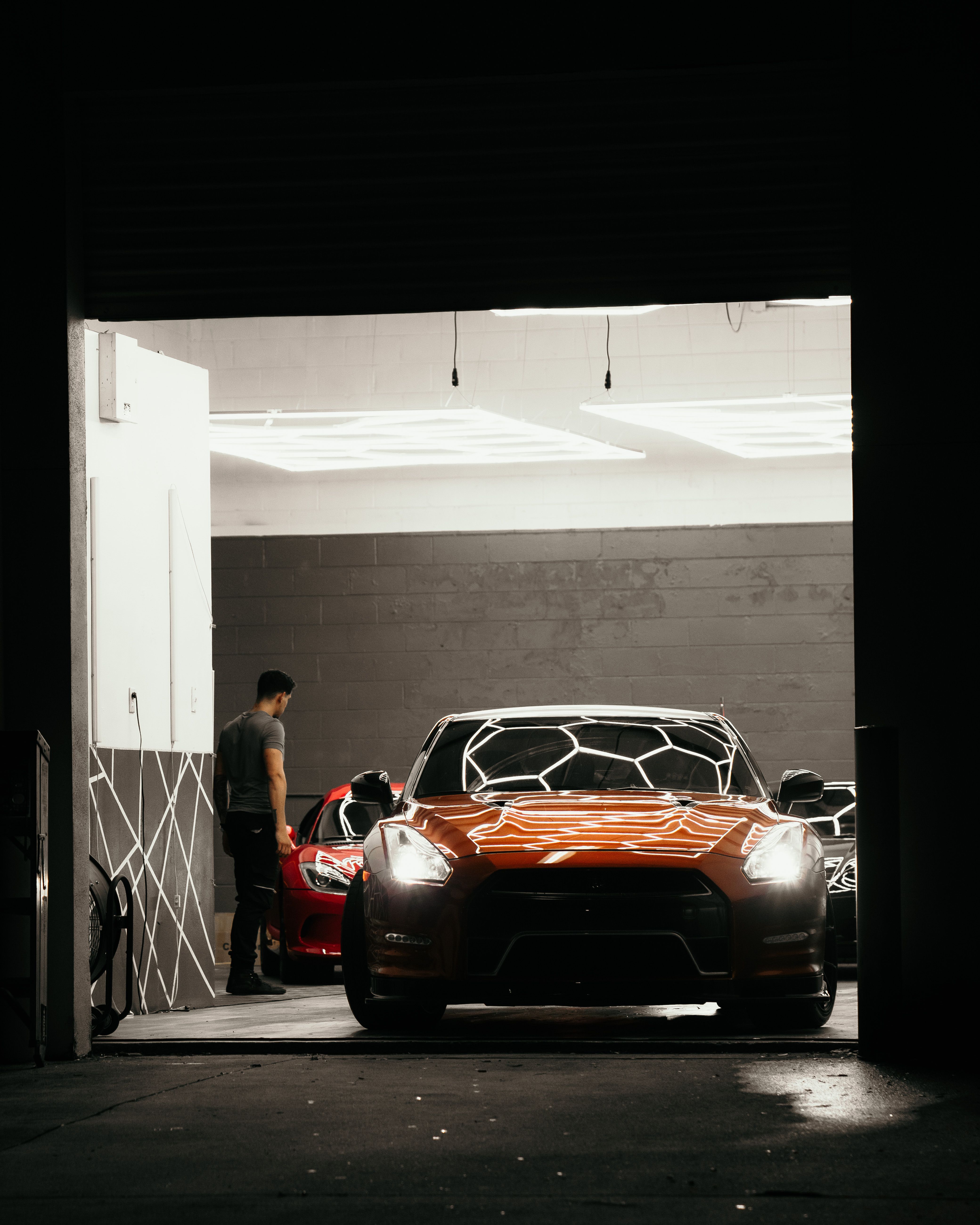 supercar in dark garage