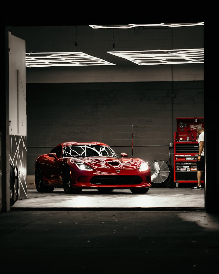 Red Ferrari 458 Italia Parked In Garage