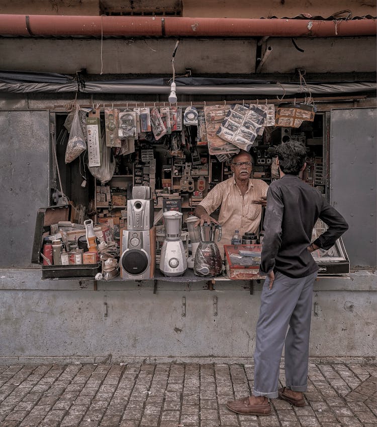 A Market Stall On A Sidewalk