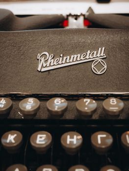 Close-up of a vintage Rheinmetall typewriter with Russian keys.