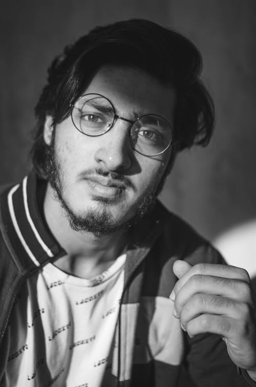 Man with Beard Wearing Round Framed Eyeglasses