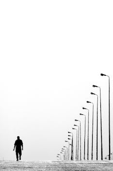 Silhouette Photo of a Man in a Tunnel · Free Stock Photo Silhouette Man Walking Tunnel