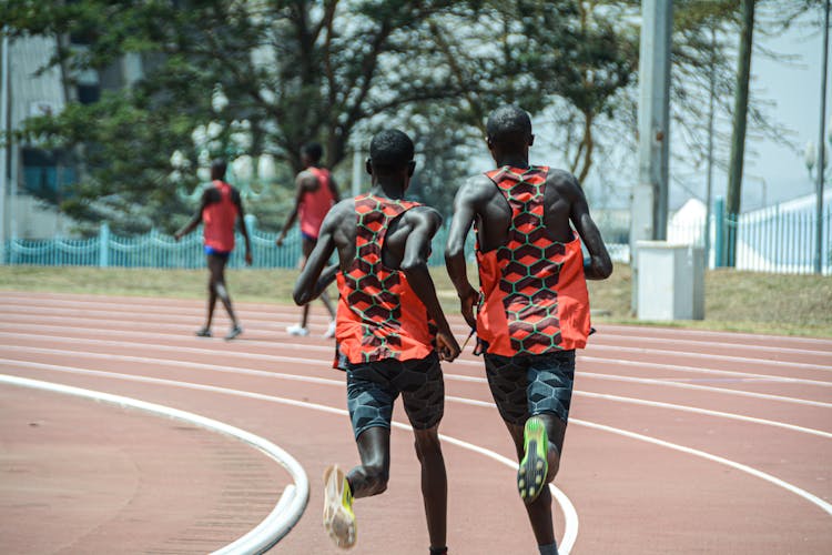 Athletes On A Running Track 
