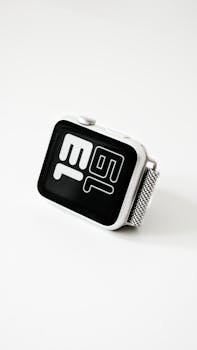 Sleek smartwatch with monochrome digital design on a white background.