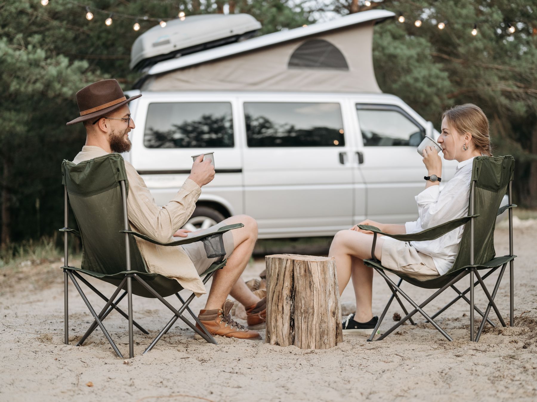 Newton Longville — movers delivering furniture from a van