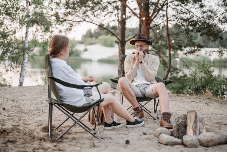 Man Playing Harmonica For Woman