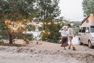 Man and Woman Kissing on Beach