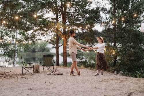 A Man and Woman Dancing in the Forest