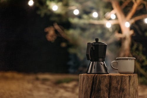 Moka Pot and Cup on Tree Stump
