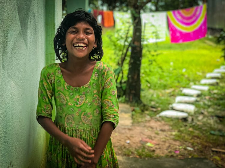 Girl In Dress Laughing