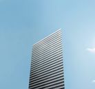 White Concrete Building Under Blue Sky