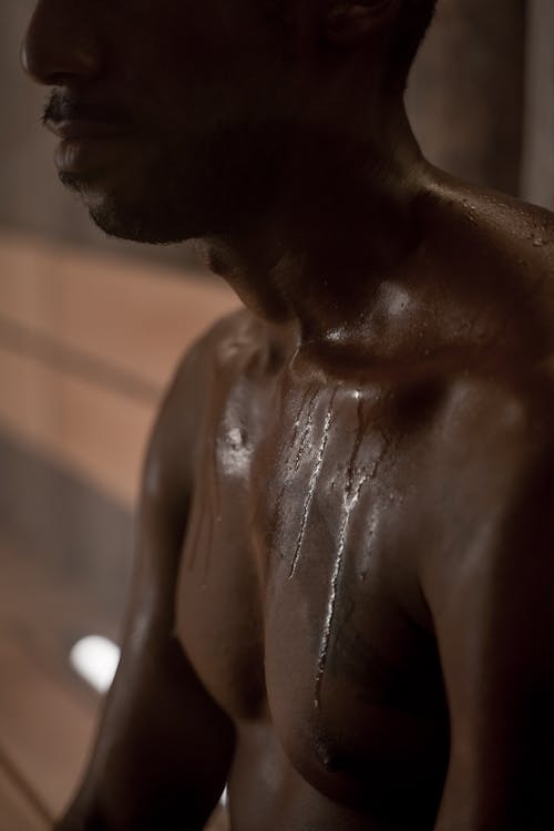 Close-up of a Shirtless Man with Wet Skin 