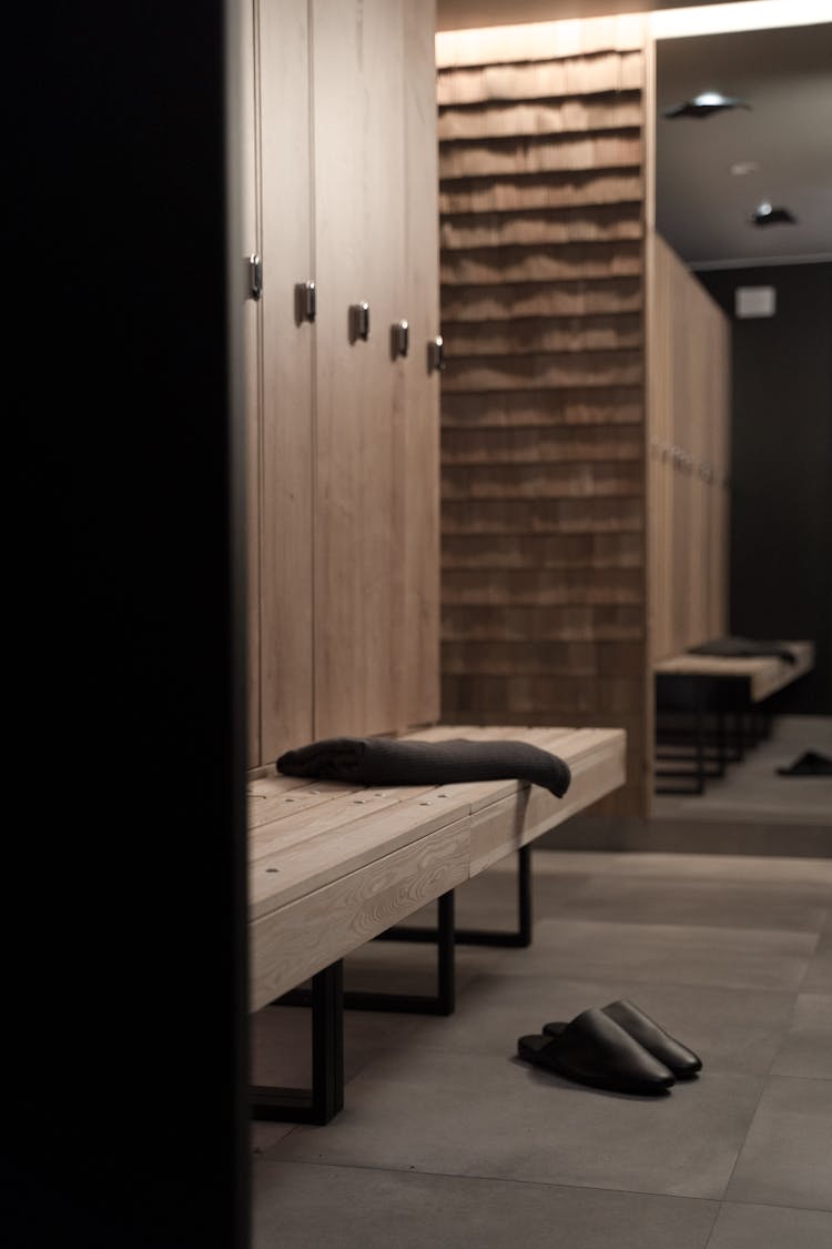 Spa Locker Room With Brown Wooden Bench