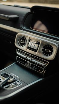 Explore the sleek design of a modern car's dashboard and controls.