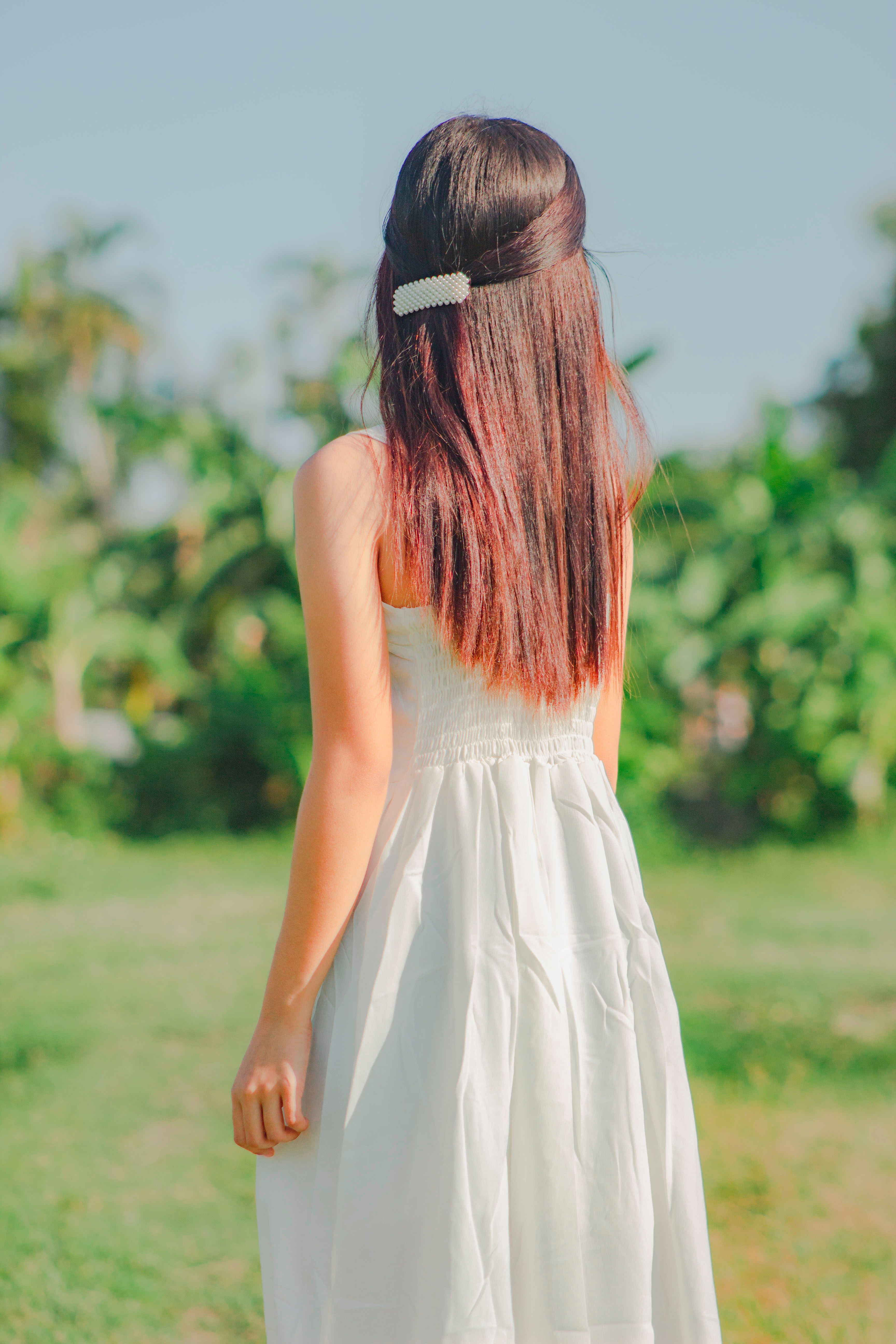 A Woman Wearing Backless Dress · Free Stock Photo