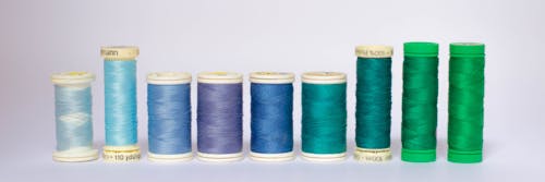 Free Shades of Blue Thread Spools Stock Photo