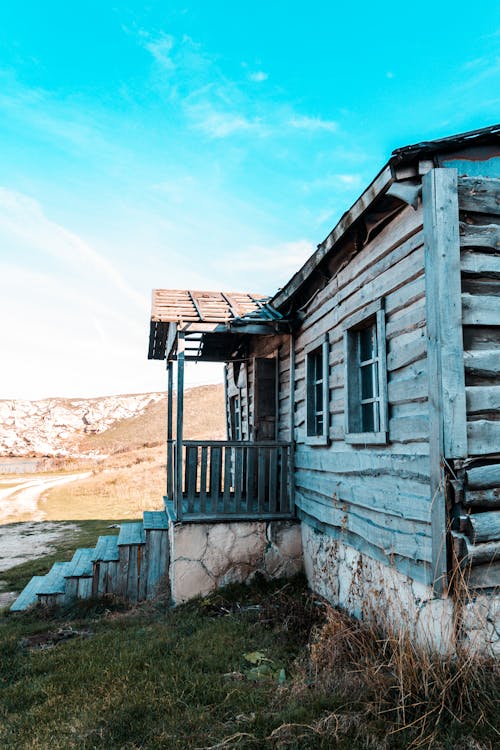 A Wooden House on the Field