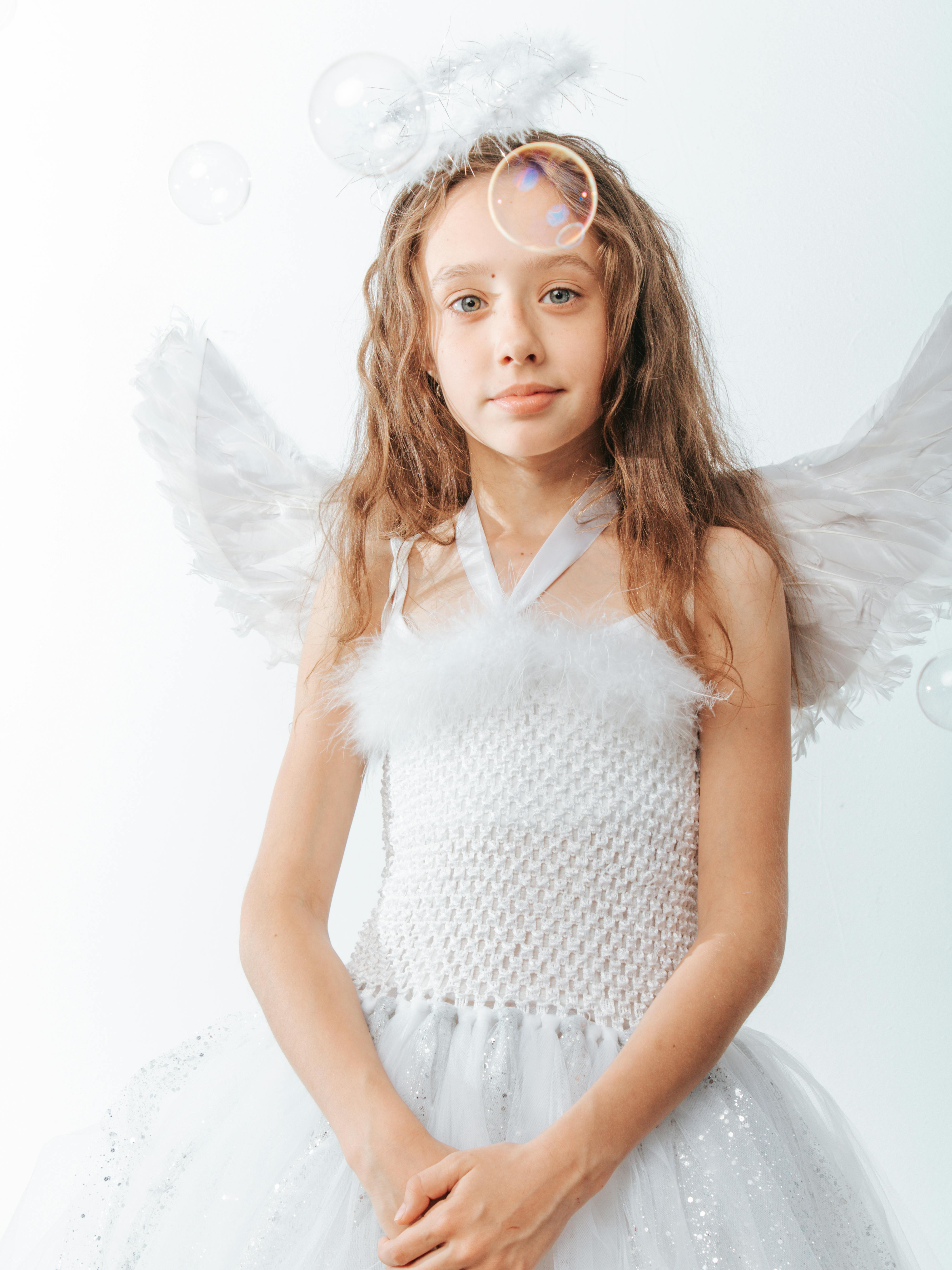 Cute Girl in Angel Costume · Free Stock Photo