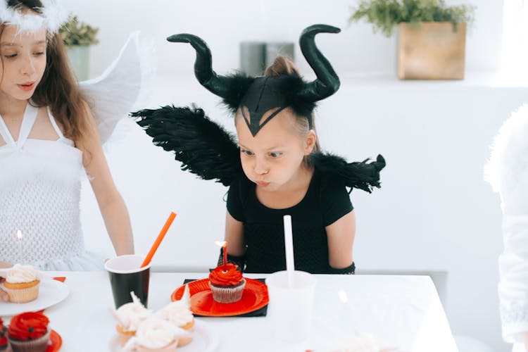 Girl In White Shirt And Black Angel Wing