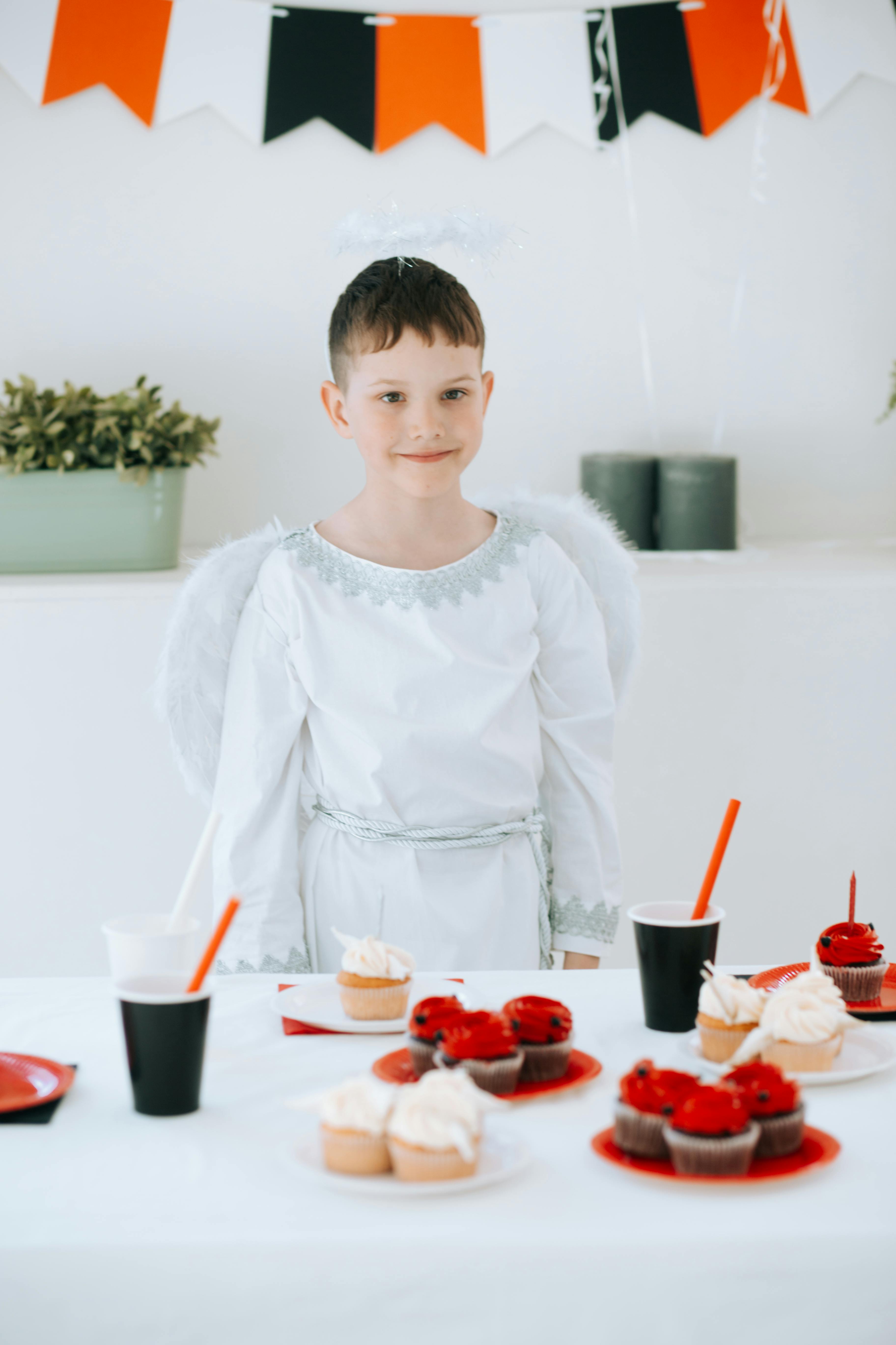 a boy in angel costume