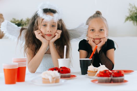 Two Girls in Halloween Costumes
