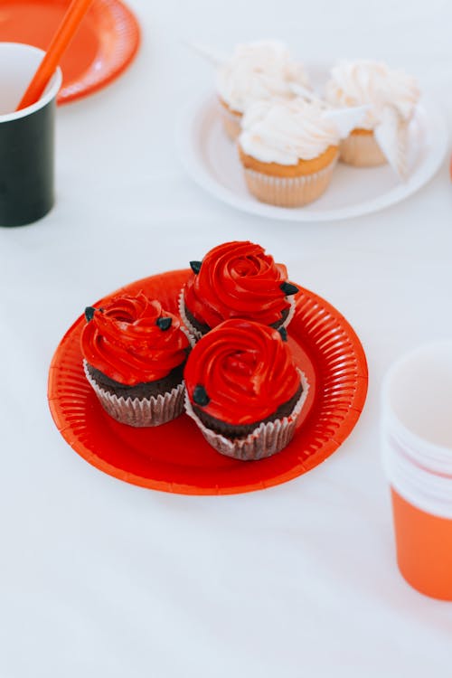 Free Delicious Cupcakes on Red Plate Stock Photo