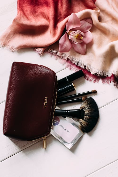 Free Beauty Products in a Leather Pouch Stock Photo