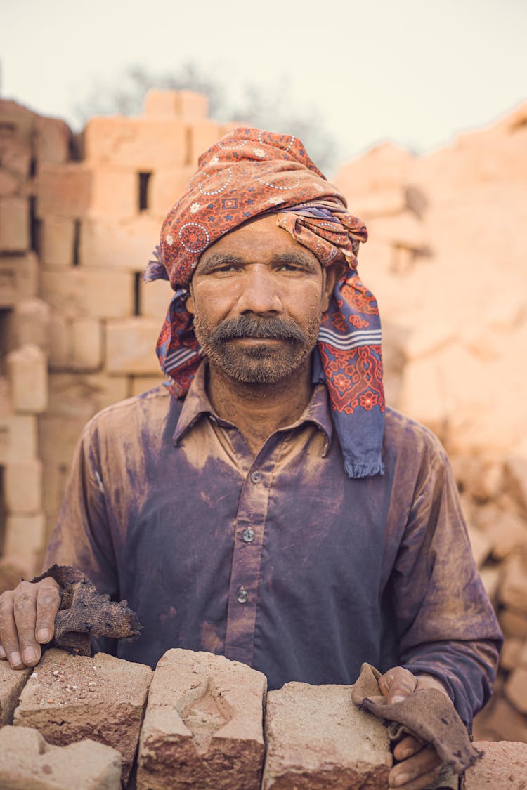 Man Working On Building Site