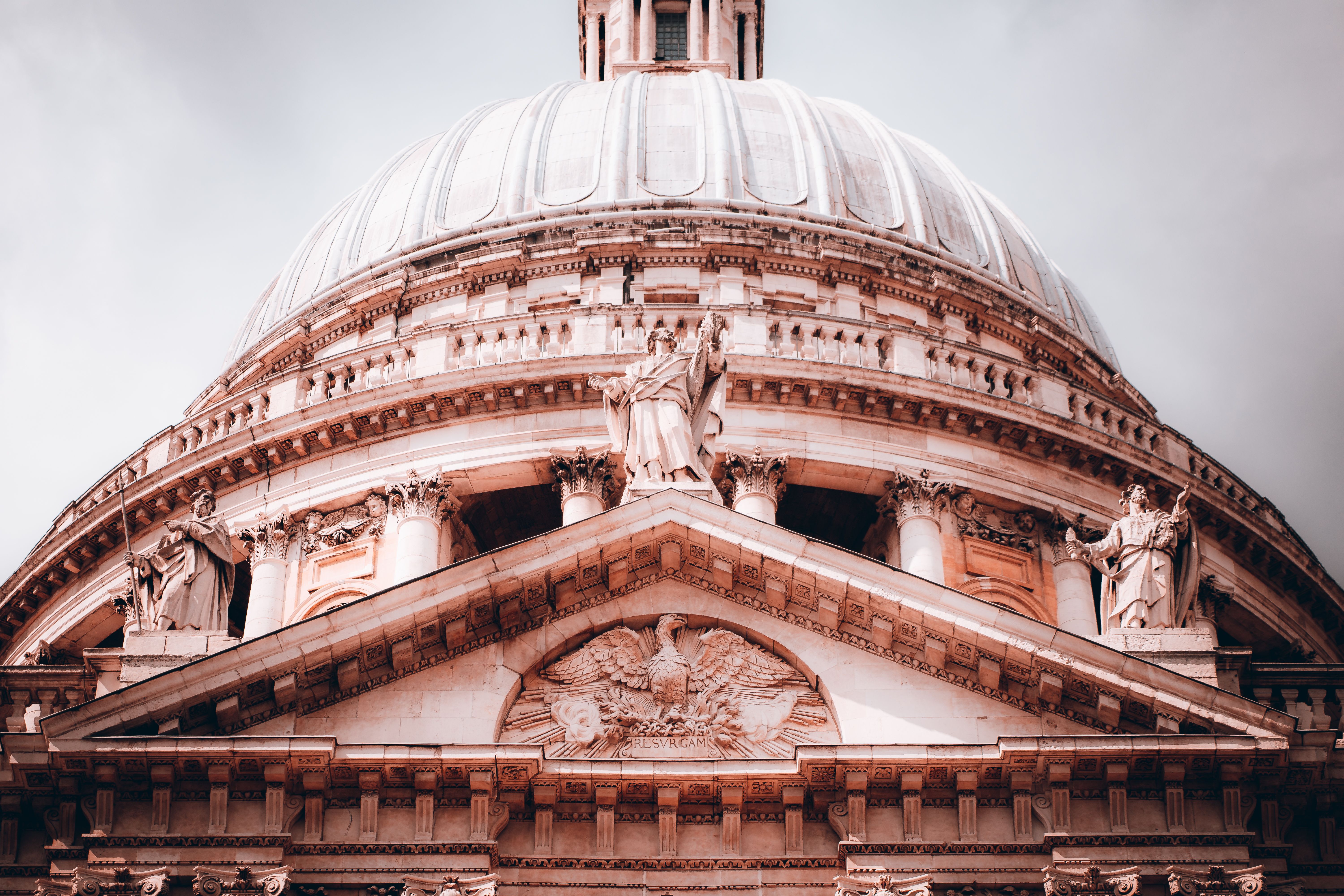 Detailed view of St. Paul's Cathedral dome in London, showcasing its intricate historical architecture.