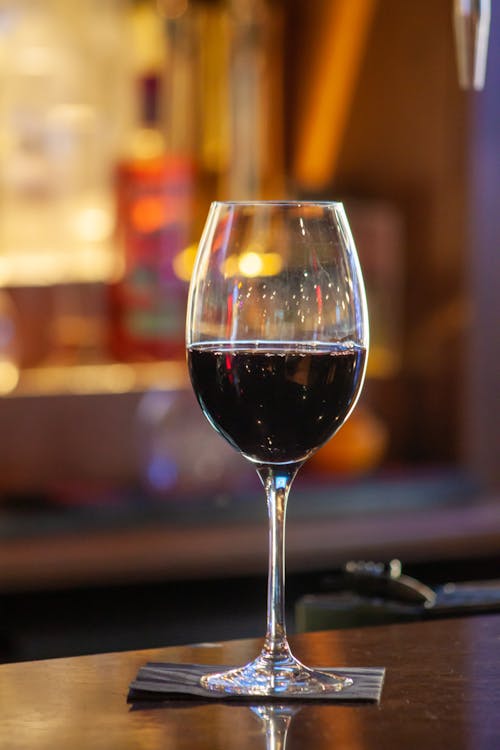 Close-Up Shot of a Glass of Red Wine