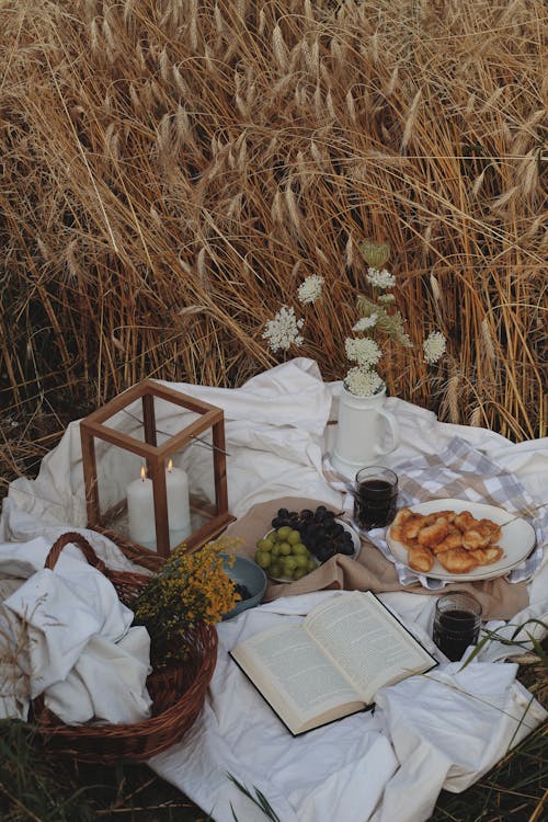 White Picnic Blanket in a Wheat Field